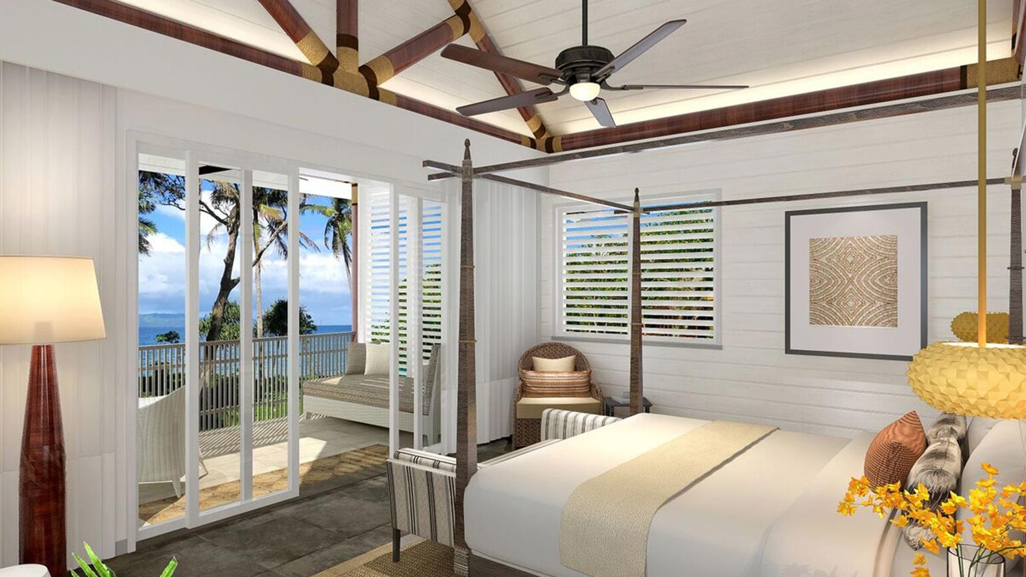 clean room with ceiling fan and view of ocean